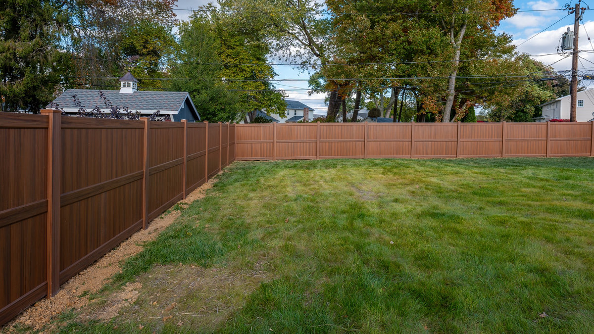 Mocha walnut vinyl fence Delaware
